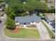 Aerial view of a well-maintained home with lush landscaping and a long driveway at 1199 Island View Dr, Mount Pleasant, SC 29464