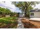 Large, fenced backyard with a shed, patio, and mature landscaping at 1199 Island View Dr, Mount Pleasant, SC 29464