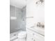 Modern bathroom features a glass-enclosed shower with gray tiling and a white vanity at 1199 Island View Dr, Mount Pleasant, SC 29464