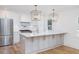 Beautiful kitchen featuring stainless appliances, a center island with bar seating, and pendant lighting at 1199 Island View Dr, Mount Pleasant, SC 29464