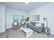 Cozy living room featuring comfortable seating, natural light, and stylish decor at 1202 Twin Rivers Dr, Wando, SC 29492