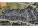 Aerial view of community showcasing lush landscaping, well-maintained buildings, and ample parking at 1225 Blakeway St # 703, Charleston, SC 29492