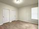 Clean bedroom with two closets, wood floors and a window at 1225 Blakeway St # 703, Charleston, SC 29492