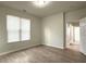 Bright bedroom with wood floors and a window with blinds at 1225 Blakeway St # 703, Charleston, SC 29492