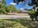 Community building featuring a multi-level brick design, a large parking area and street lights at 1225 Blakeway St # 703, Charleston, SC 29492