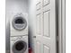 Convenient laundry area with a stacked washer and dryer unit for efficient space-saving at 1225 Blakeway St # 703, Charleston, SC 29492