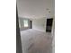 Spacious bedroom with grey walls, trim and access to a bathroom at 127 Seaton St, Summerville, SC 29486