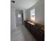 Unfinished hallway with dark wood cabinets and stainless steel pulls at 127 Seaton St, Summerville, SC 29486
