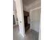 Mudroom featuring a dark wood storage bench with hooks and cabinets, conveniently located by a white door at 127 Seaton St, Summerville, SC 29486