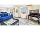 Comfortable living space with coastal decor and ocean views at 128 Palmetto Blvd, Edisto Beach, SC 29438