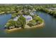 Stunning aerial view of a beautiful lakeside home with lush greenery and scenic water views at 1391 Royston Rd, Mount Pleasant, SC 29464