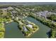 Stunning aerial view of island home surrounded by water, lush greenery, and beautiful neighborhood at 1391 Royston Rd, Mount Pleasant, SC 29464