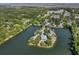 Beautiful aerial view of a waterfront home situated on an island surrounded by a lush landscape at 1391 Royston Rd, Mount Pleasant, SC 29464