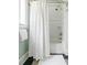 Bathroom featuring a shower and bathtub with a white shower curtain and tile surround at 1391 Royston Rd, Mount Pleasant, SC 29464