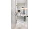 Stylish bathroom with a glass shower, marble floors, pedestal sink, and classic decor at 1391 Royston Rd, Mount Pleasant, SC 29464