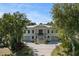 Stunning two-story home featuring a grand entrance with dual garages and meticulously landscaped grounds at 1391 Royston Rd, Mount Pleasant, SC 29464