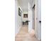 Bright hallway with beautiful hardwood floors and an open elevator door for easy access at 1391 Royston Rd, Mount Pleasant, SC 29464