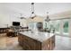 Island kitchen with marble counters, stainless appliances, and an open design at 1391 Royston Rd, Mount Pleasant, SC 29464