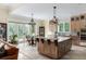 Bright kitchen with stone counters, stainless appliances, and an open breakfast area at 1391 Royston Rd, Mount Pleasant, SC 29464