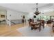 Open-concept living room features a dining area and comfortable lounge space for seamless entertaining at 1391 Royston Rd, Mount Pleasant, SC 29464
