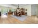 Open floor plan with hardwood floors, dining area, and access to outdoor space at 1391 Royston Rd, Mount Pleasant, SC 29464
