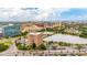 View of building near small lake, parking lot, and urban landscape at 14 Lockwood Dr # 6I, Charleston, SC 29401