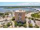 Aerial view of building, with nearby bridges, waterways, and marina at 14 Lockwood Dr # 6I, Charleston, SC 29401