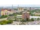 View of building near lake with cityscape and roadway at 14 Lockwood Dr # 6I, Charleston, SC 29401