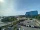 View from building shows cars, the city, trees and clouds during daytime at 14 Lockwood Dr # 6I, Charleston, SC 29401