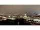 Nighttime view of city buildings and highways from a condo window showcases a skyline at 14 Lockwood Dr # 6I, Charleston, SC 29401