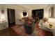 Comfortable living room featuring a patterned rug, sofa, chairs, lamps, and other decor at 14 Lockwood Dr # 6I, Charleston, SC 29401