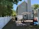 Beautiful backyard showcasing a patio with outdoor furniture and a white picket fence for privacy at 1418 Whispering Oak Trl, Mount Pleasant, SC 29466
