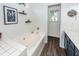 Modern bathroom with a soaking tub, vanity, and sleek fixtures, creating a spa-like retreat at 1418 Whispering Oak Trl, Mount Pleasant, SC 29466