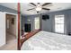 Inviting bedroom features a cozy bed, television, and ample natural light, creating a relaxing retreat at 1418 Whispering Oak Trl, Mount Pleasant, SC 29466