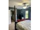 Bedroom with gray walls features a four-poster bed and carpet flooring at 1418 Whispering Oak Trl, Mount Pleasant, SC 29466