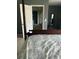 Gray Primary bedroom featuring a four-poster bed, gray walls, and carpet flooring at 1418 Whispering Oak Trl, Mount Pleasant, SC 29466
