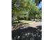 Charming two-story home nestled among mature trees along a quiet street, showcasing curb appeal and a welcoming neighborhood at 1418 Whispering Oak Trl, Mount Pleasant, SC 29466