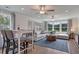 Spacious living room with a large sectional sofa, stylish decor, and abundant natural light at 142 Seaton St, Summerville, SC 29486
