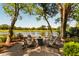 Picturesque backyard featuring a fire pit and comfortable seating, ideal for outdoor gatherings at 15 Edgewater Aly, Isle of Palms, SC 29451
