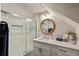 Bright bathroom featuring a tub-shower combo with glass doors and a stylish vanity at 15 Edgewater Aly, Isle of Palms, SC 29451