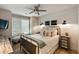 Cozy bedroom featuring ship lap walls, a comfortable bed, and modern ceiling fan at 15 Edgewater Aly, Isle of Palms, SC 29451