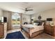 Charming bedroom featuring water views, a ceiling fan, and tasteful nautical decor at 15 Edgewater Aly, Isle of Palms, SC 29451