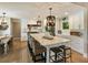 Spacious, open kitchen with a large center island, modern appliances, and pendant lighting at 15 Edgewater Aly, Isle of Palms, SC 29451