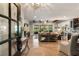 Inviting living room with hardwood floors, exposed wood beams, and an open layout, perfect for entertaining at 15 Edgewater Aly, Isle of Palms, SC 29451