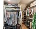 Large walk-in closet with clothing racks and shoe shelves, providing ample storage space at 15 Edgewater Aly, Isle of Palms, SC 29451