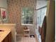 Bathroom with floral wallpaper, a shower with a glass door, and a vanity at 1578 Harborsun Dr, Charleston, SC 29412