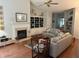 Bright living room with hardwood floors, fireplace, built-in shelves, and comfortable seating at 1578 Harborsun Dr, Charleston, SC 29412