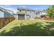 Spacious backyard featuring a screened in porch, wooden fence, and playground set at 160 Cherry Grove Dr, Summerville, SC 29483
