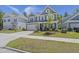 Charming two-story home with a manicured lawn, a two-car garage, and attractive landscaping at 160 Cherry Grove Dr, Summerville, SC 29483
