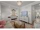 Bright living room with stylish decor, a modern chandelier, and comfortable seating at 160 Cherry Grove Dr, Summerville, SC 29483